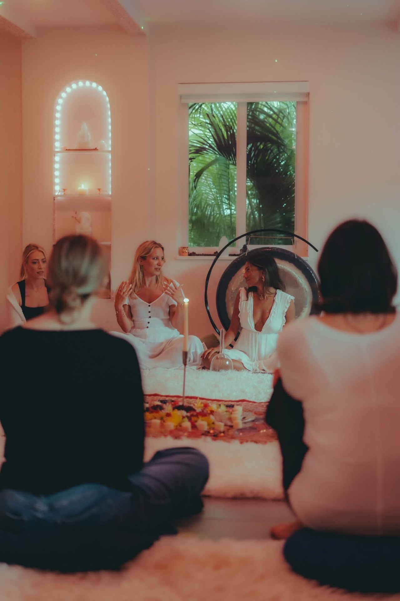 Nimi holding space at a gong bath ceremony